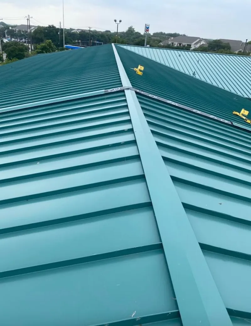 Green commercial metal roof ridge and valley for Metal Roof Repair in Duncan