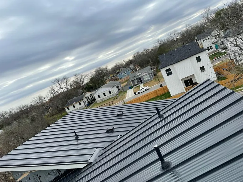 Standing seam metal roof panels with vents for Skylight Repair in Duncan